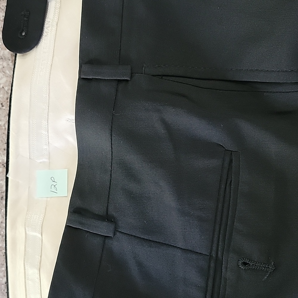 Hickey Freeman Size 40 wool pleated pants, cuff 29". Excellent condition.